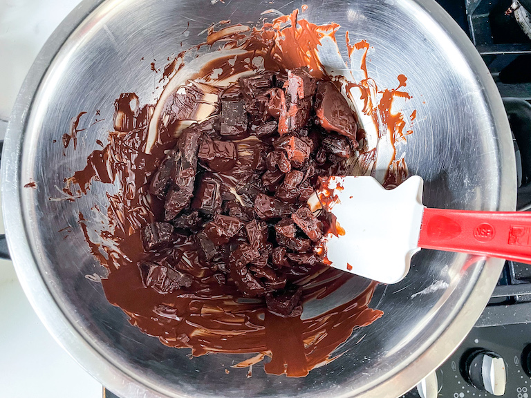 Dark chocolate melting in a bowl