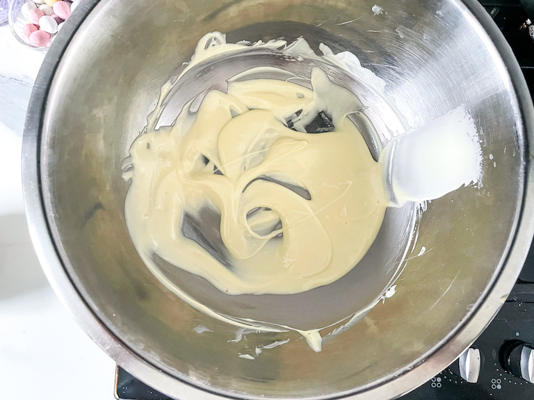 Melted white chocolate in a bowl
