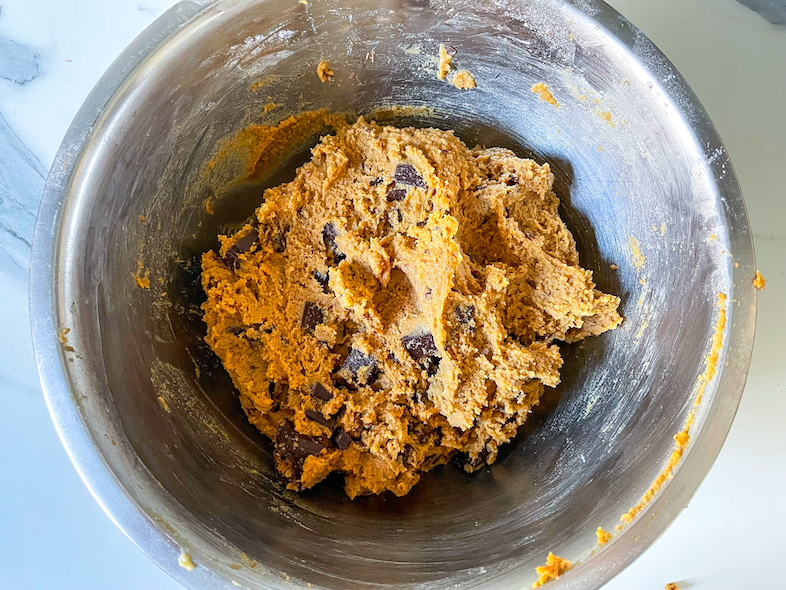 Tahini chocolate chunk cookie dough in a bowl