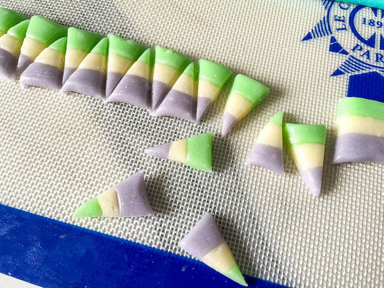 Purple, green, and white homemade candy corn kernels