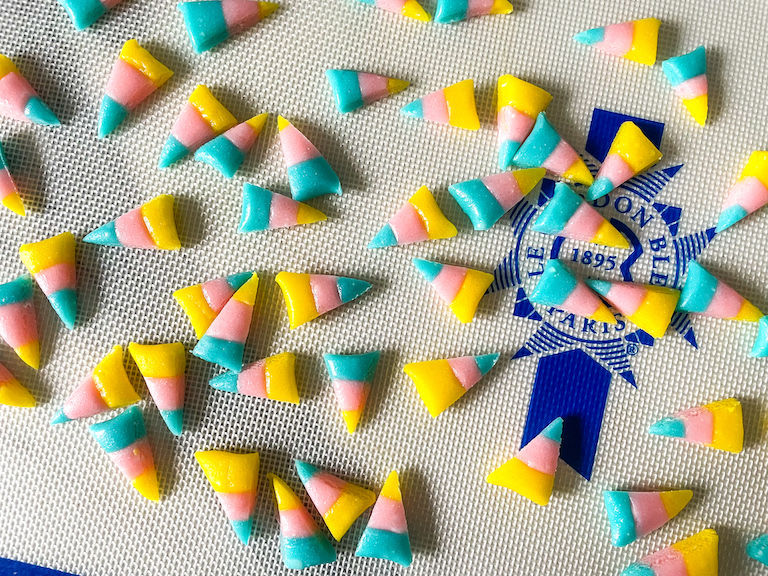Yellow, pink, and blue candy corn