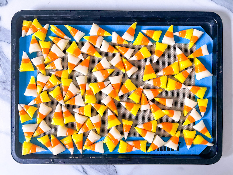 Pieces of candy corn on a tray
