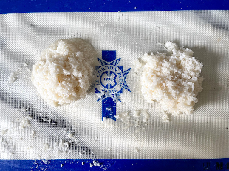 Two mounds of coconut candy mixture on a silicone mat with blue Le Cordon Bleu logo