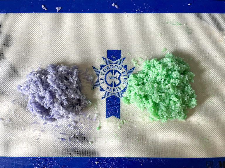 Purple and green coconut candy mixture on a silicone mat with Le Cordon Bleu logo