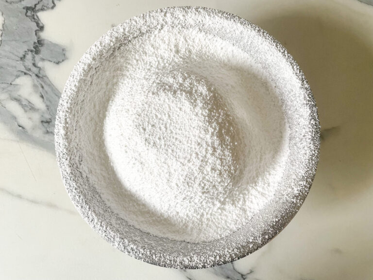 Sifted confectioner's sugar in a bowl