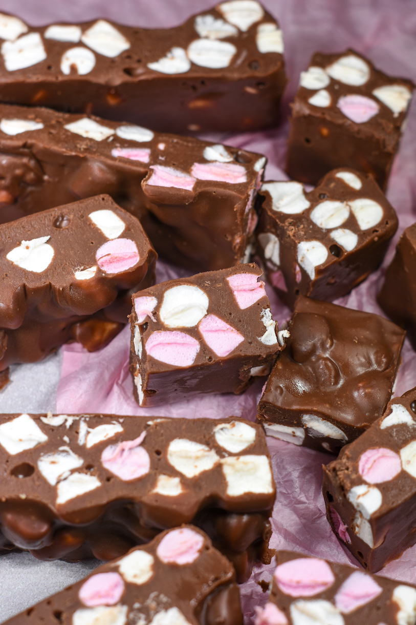 3 ingredient easy fudge arranged on a sheet of pink tissue