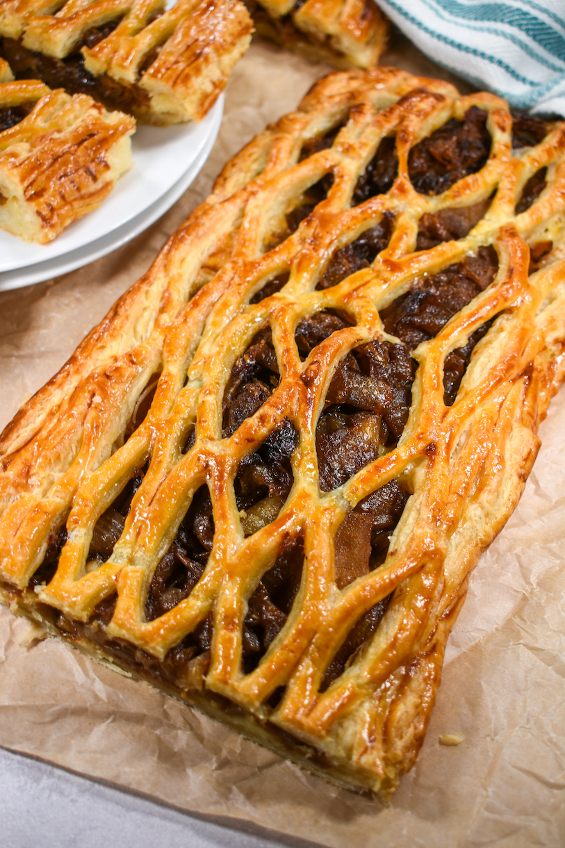 Caramelized onion puff pastry tart with lattice top