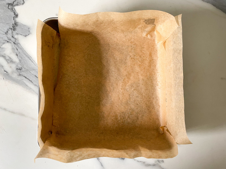 A tin lined with parchment