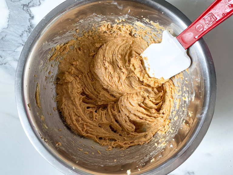 Blondie recipe batter in a bowl with spatula