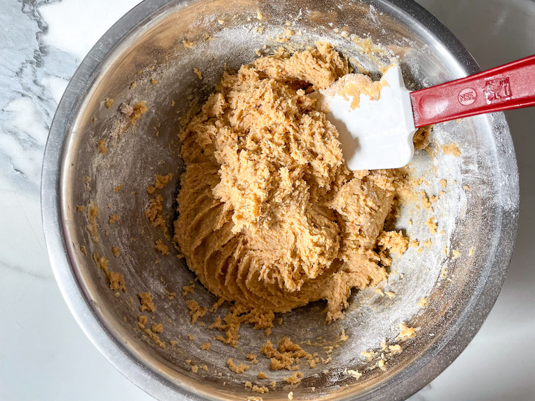 Blondie batter in a bowl with a spatula