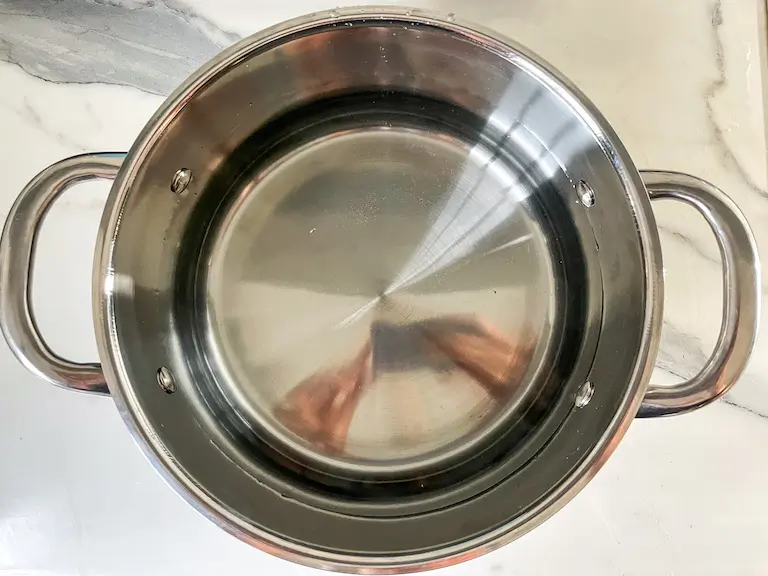 Stock pot on a marble surface