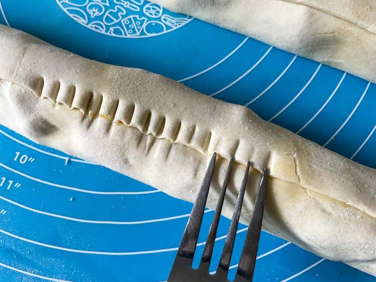 A fork crimping puff pastry