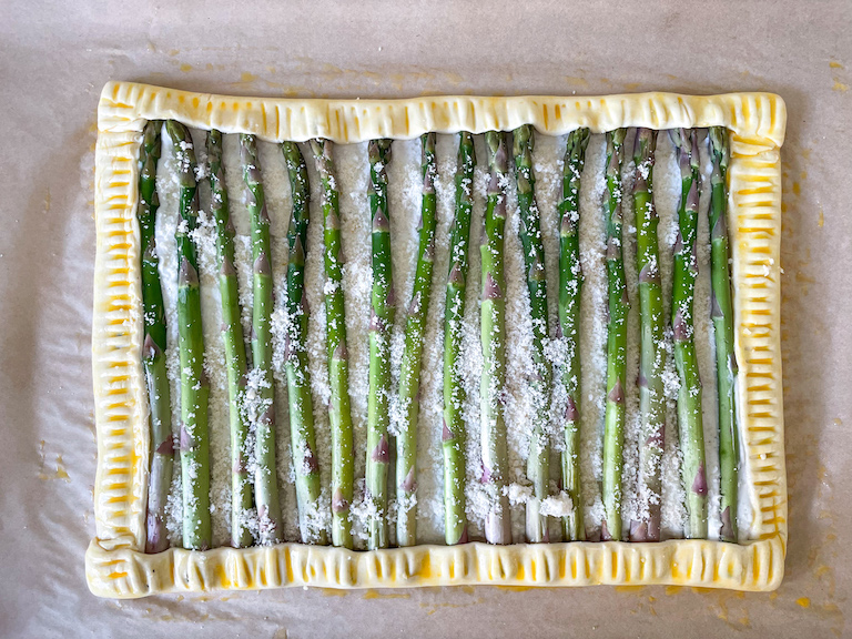 Unbaked asparagus and cheese tart