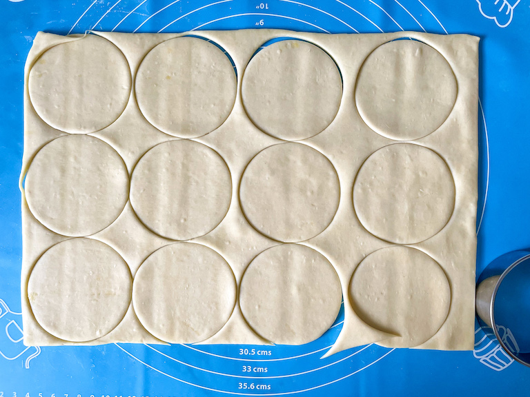 Pastry discs on a rolling mat