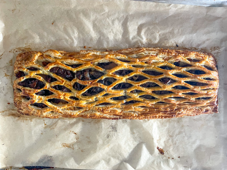 Lattice pastry with cheese and caramelized onions