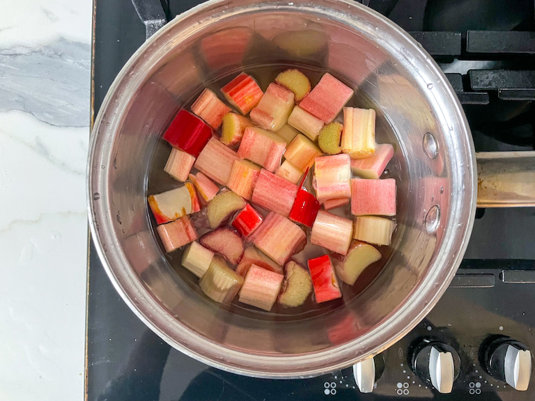 Chopped rhubarb in a saucepan on the stovetop