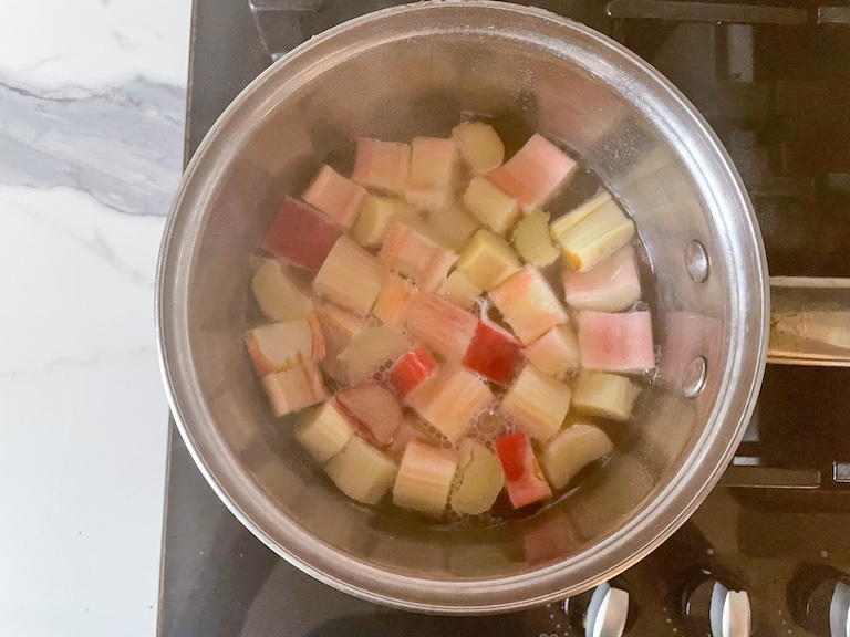 Cooking rhubarb in a saucepan on the stovetop