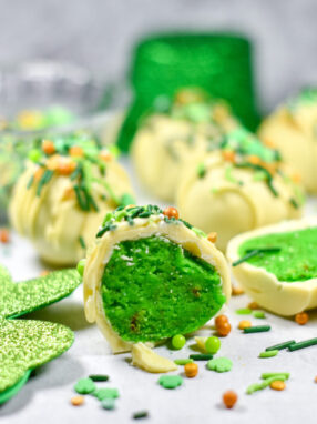 Bright green peppermint cake balls for Saint Patrick's Day.