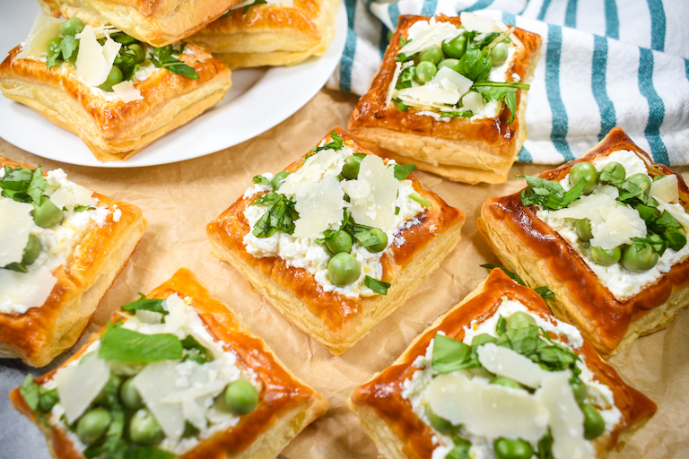 Pea and mint tarts on a sheet of parchment