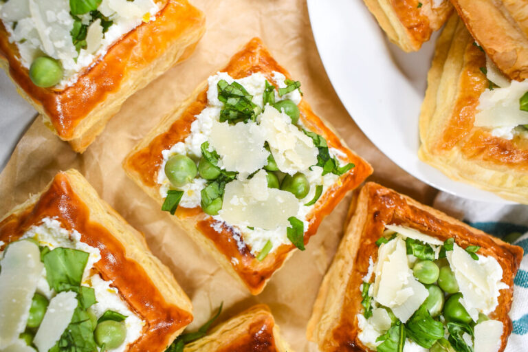 Puff pastry tartlets on a sheet of parchment