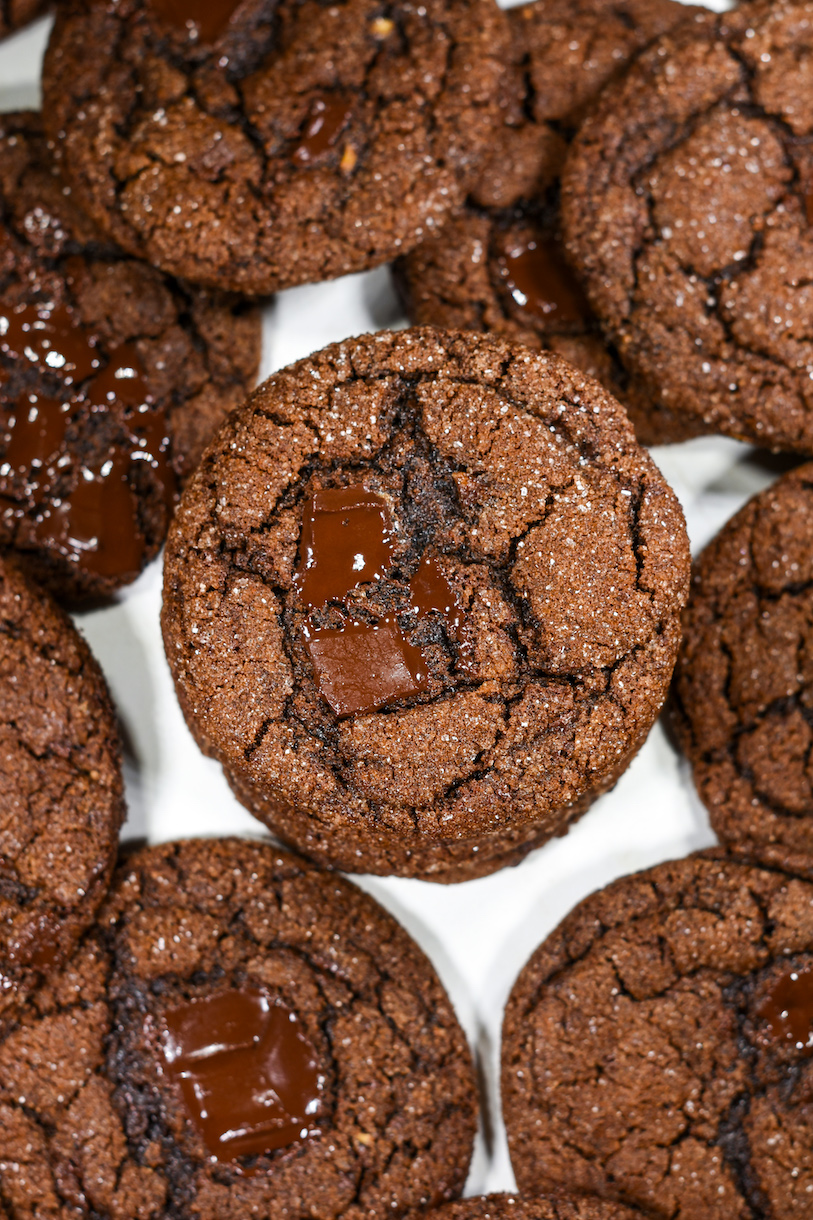 looking down at molasses cookies on a white surface