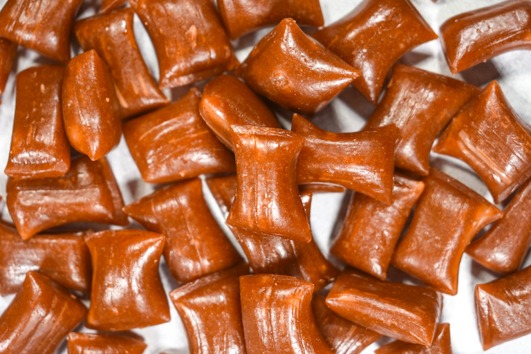 Pieces of candy made from this root beer candy recipe