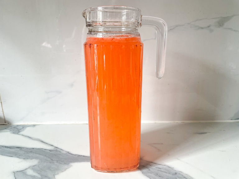 A pitcher of rhubarb and strawberry lemonade