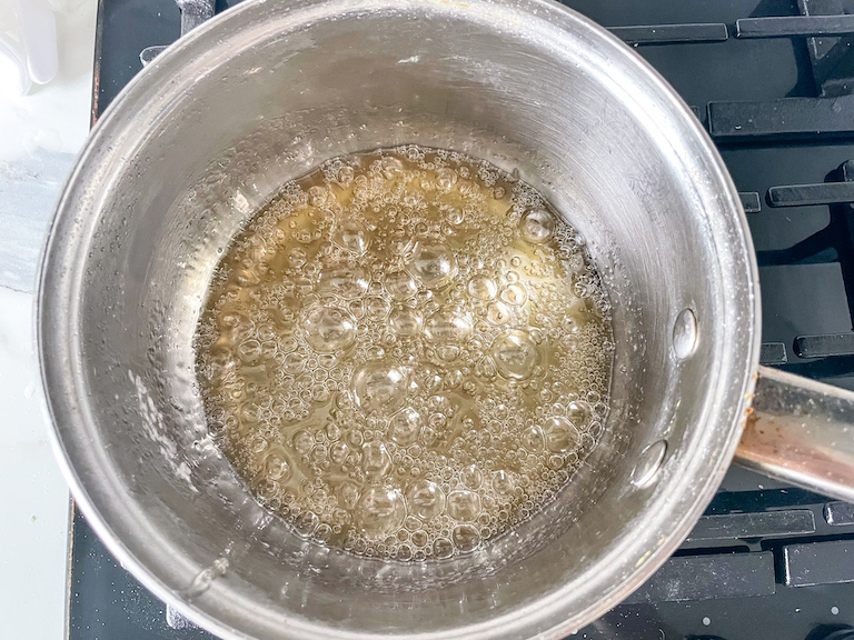 Sugar boiling in a pan on the stovetop