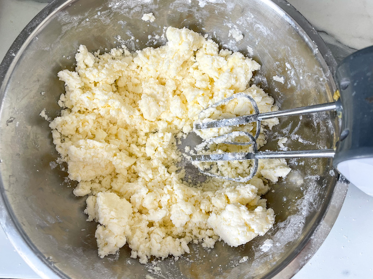 Butter mints dough in a bowl with a mixer