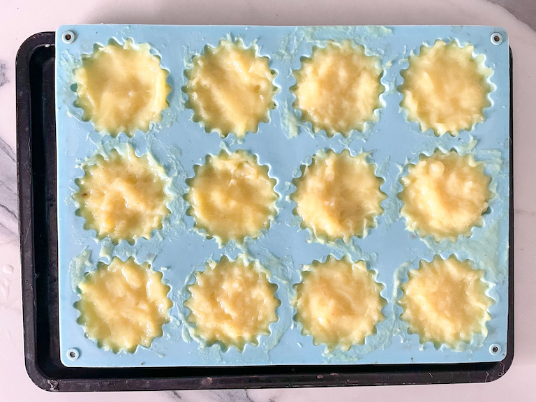 Silicone tart mould filled with homemade vanilla pudding