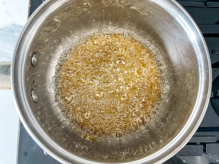 Caramel bubbling in a saucepan