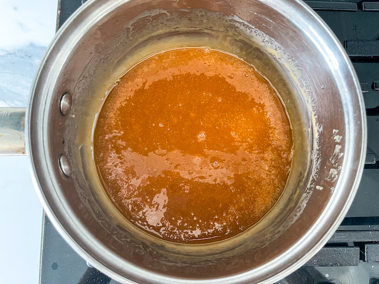 Homemade caramel sauce in a pan
