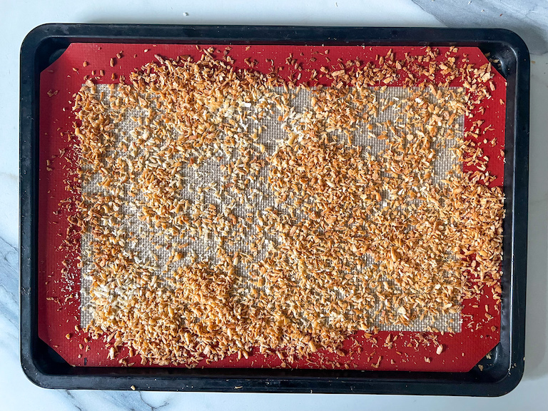Toasted coconut on a tray