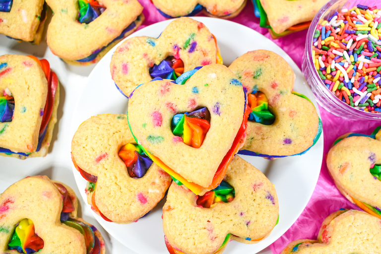 Plate of heart shaped rainbow cookies
