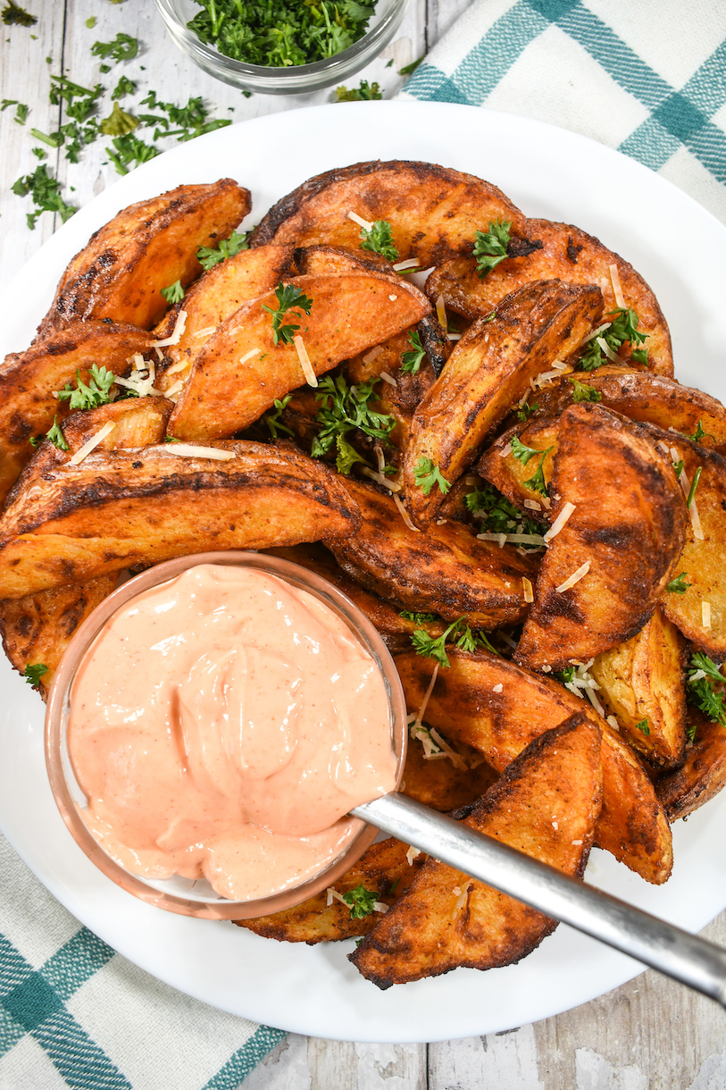 A plate of roasted potato wedges