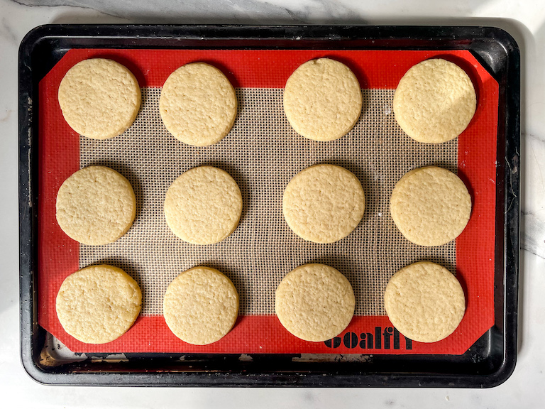 Round sugar cookies on a tray
