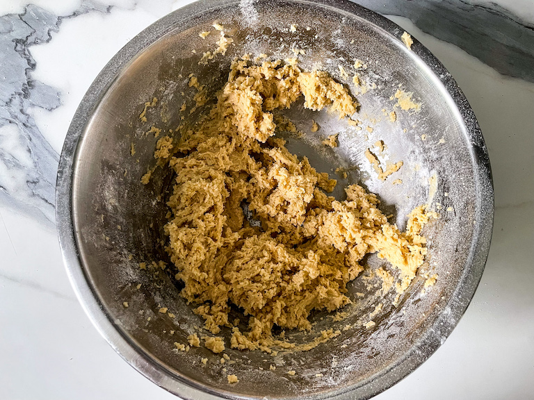 Cookie dough ingredients in a metal bowl