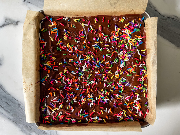 Frosted cookie bars with rainbow sprinkles