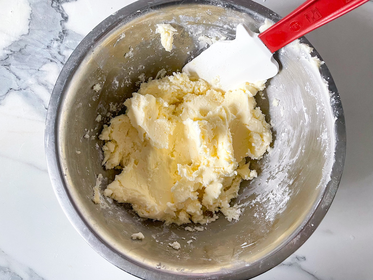 Butter in a bowl with a spatula