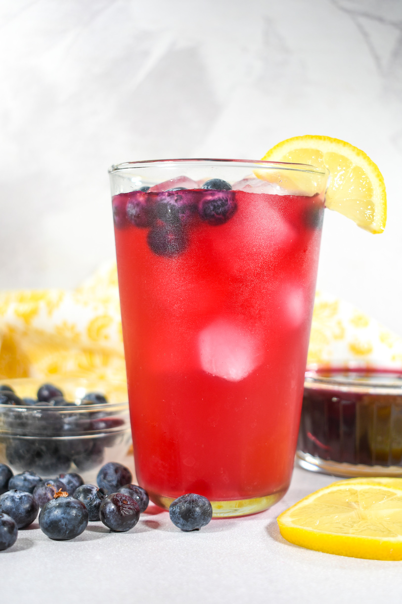 A glass of homemade blueberry lemonade