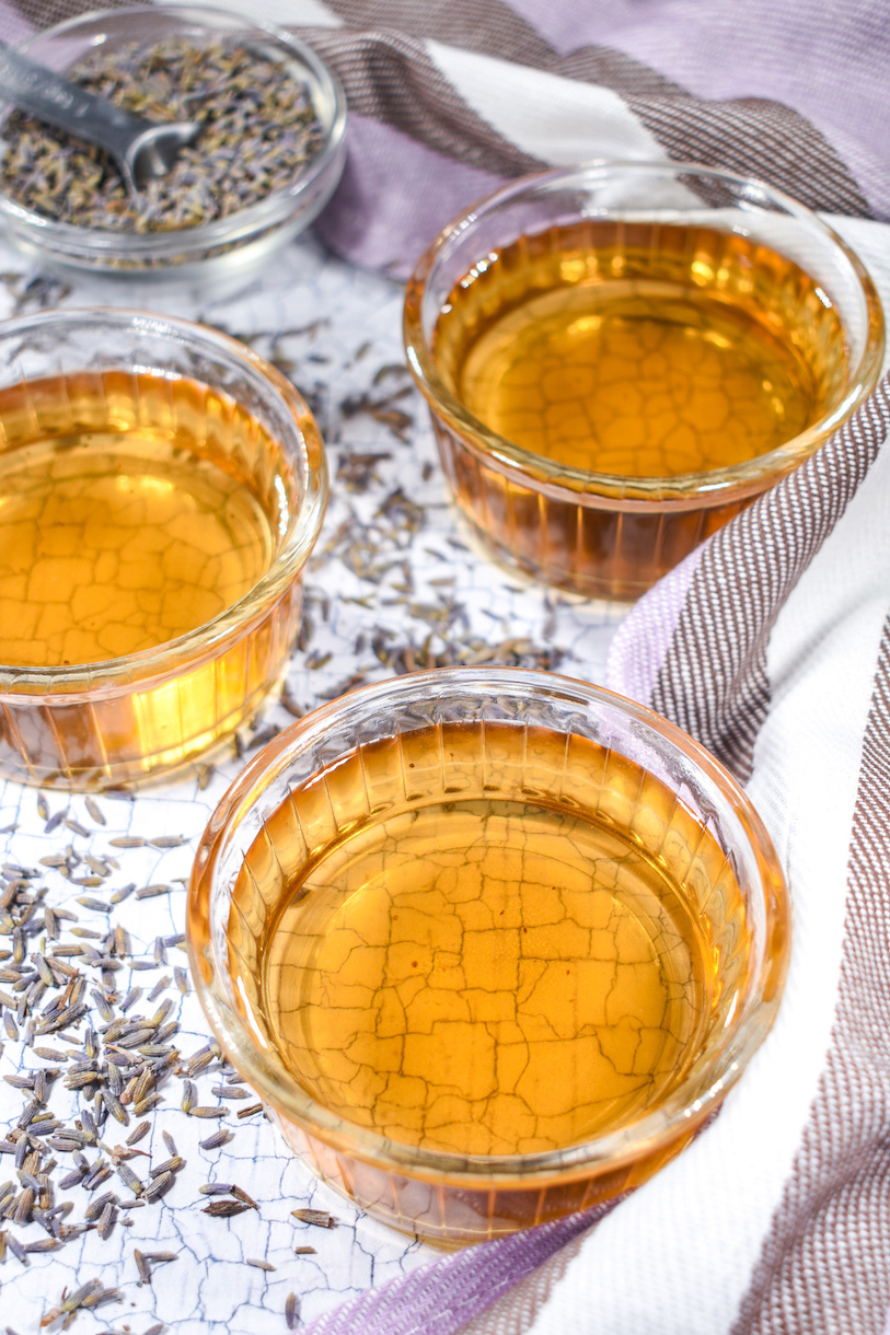Glass dishes of homemade lavender syrup