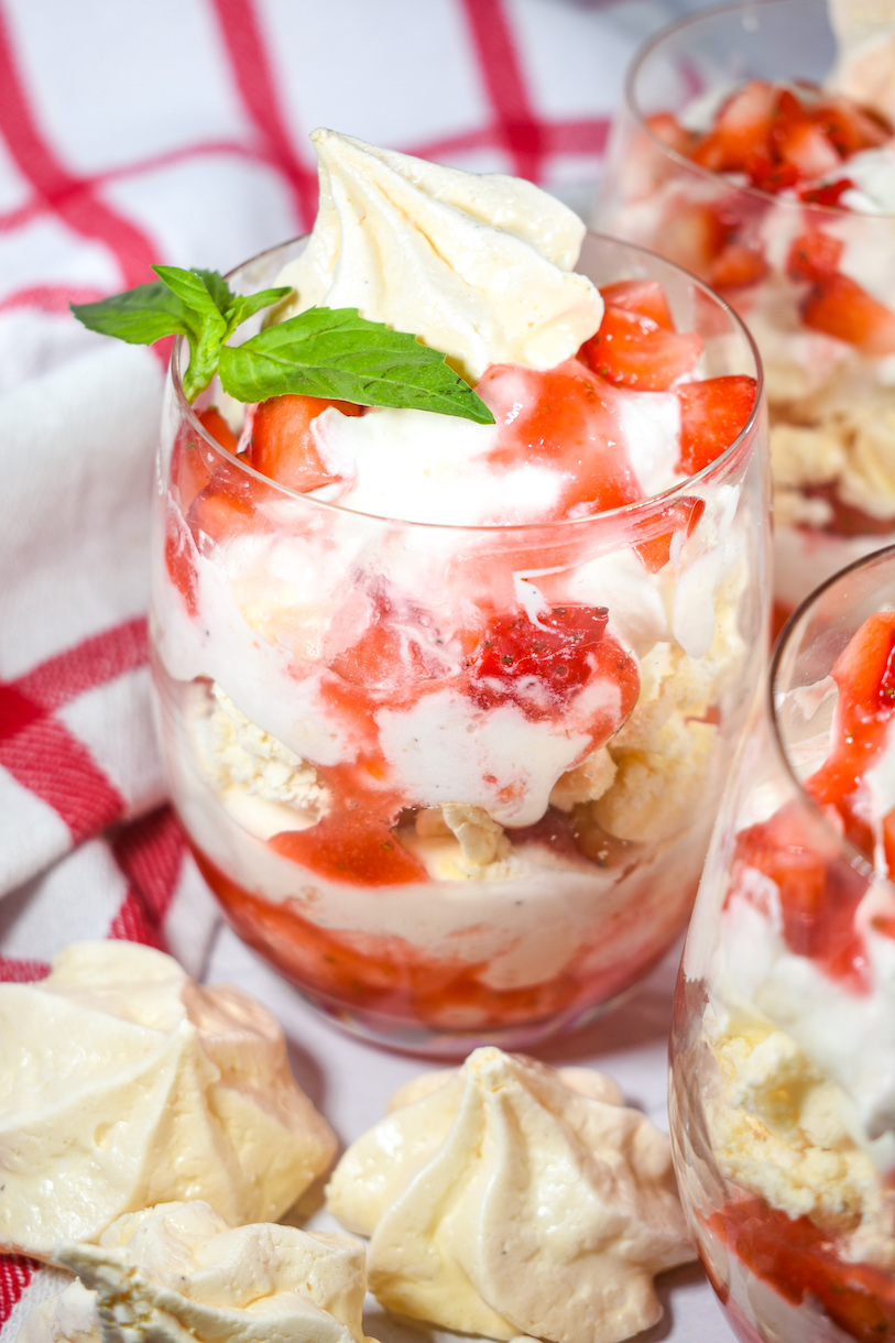 Eton Mess garnished with meringue and fresh mint