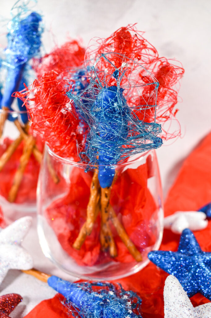 Spun sugar sparklers in a wine glass