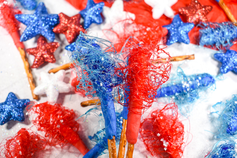 Red and blue spun sugar pretzel stick sparklers for July 4th