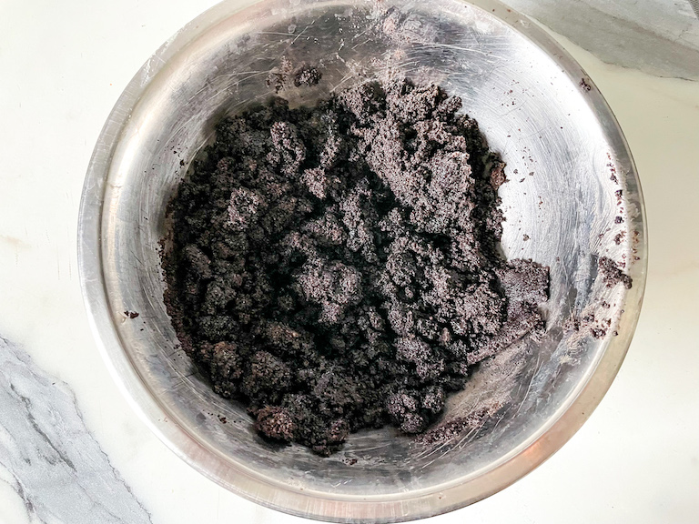 Oreo crust mixture in a bowl