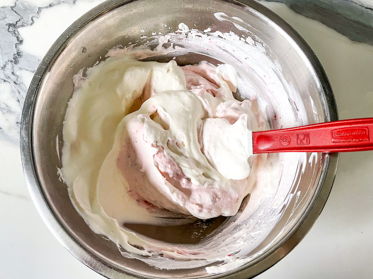 Pie filling in a bowl with a spatula