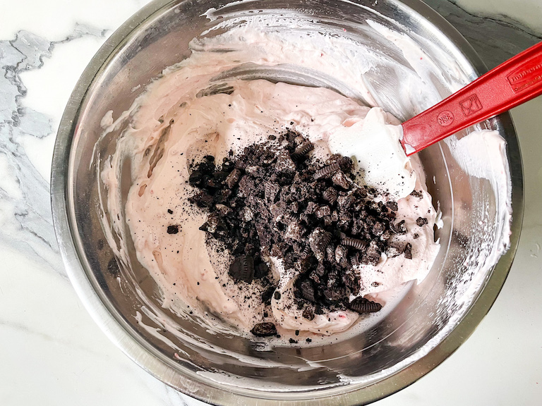 Folding Oreos into pie filling mixture