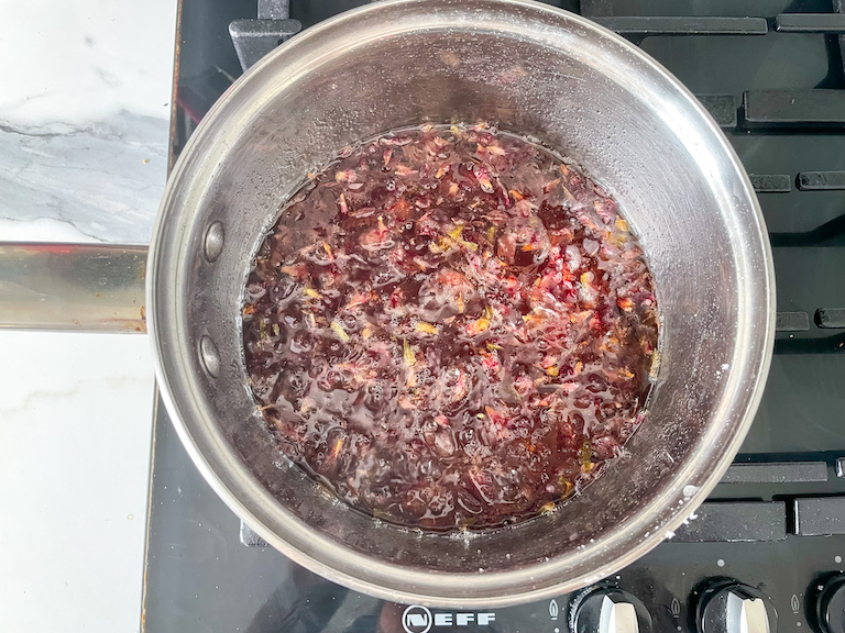 Saucepan on the stovetop, simmering rose simple syrup