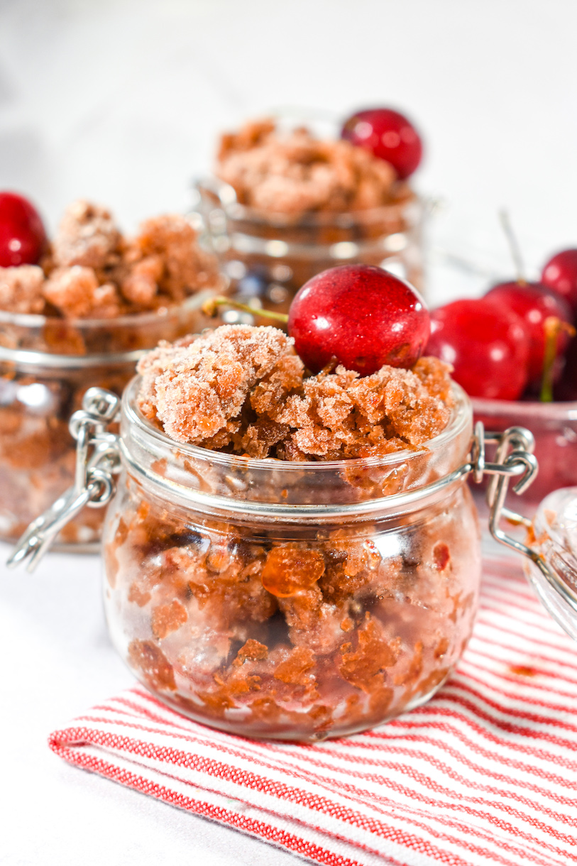 Cherry cola granita, striped red and white towel, and fresh cherries