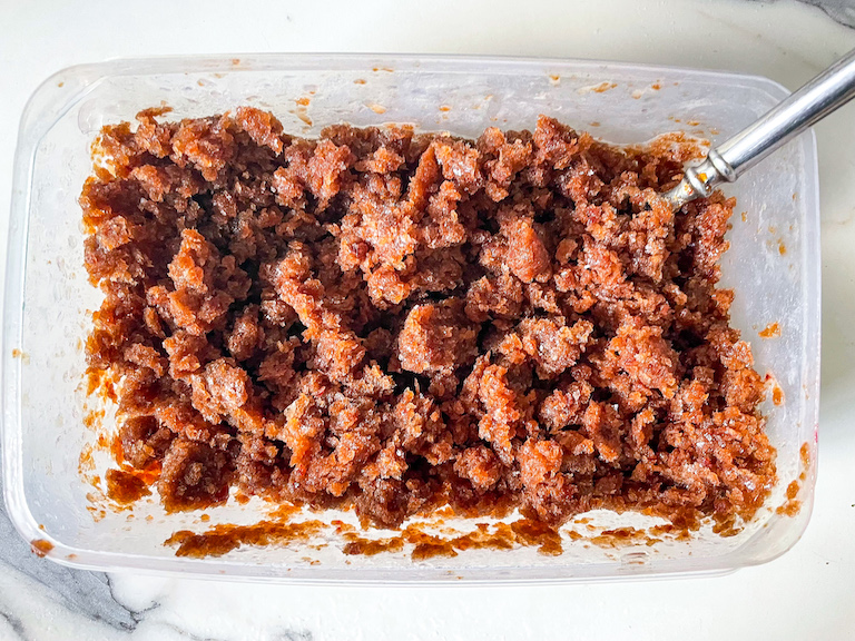 plastic container of granita with a fork